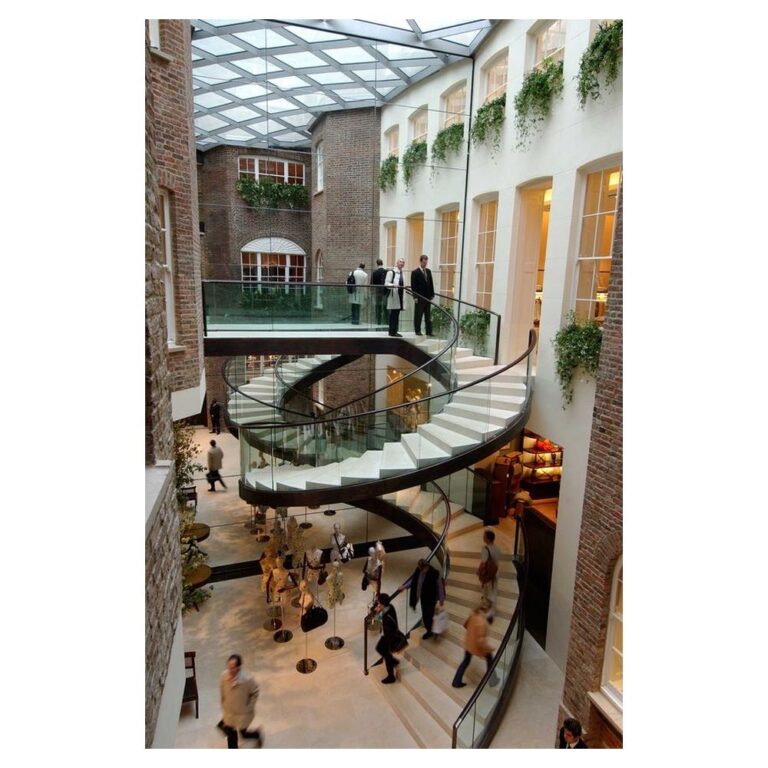 Modern interior with spiral staircase.